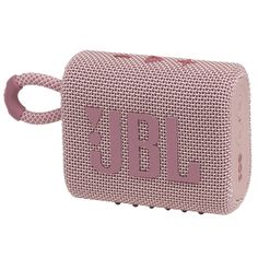 a pink speaker with the word jbl on it's front and side panels