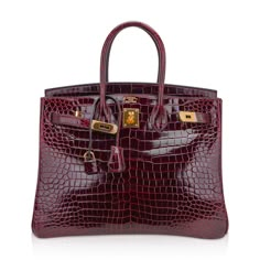 Hermes Birkin HSS 35 featured rich Bordeaux in Porosus Crocodile. An exquisite Hermes crocodile handbag in jewel toned deep bordeaux.Accentuated with gold hardware.This special order genuine crocodile skin bag is a magnificent addition to any Hermes handbag collection.Comes with lock, keys, clochette, sleepers, raincoat and signature Hermes box.NEW or NEVER For 22 years Mightychic has offered superb customer service that meets exquisite Hermes selections at your fingertips. final sale BAG MEASUR Birkin Crocodile, Hermes Crocodile, Hermes Special Order, Crocodile Handbags, Black Honey, Dream Bag, Peter Lindbergh, Hermes Shoes, Hermes Box