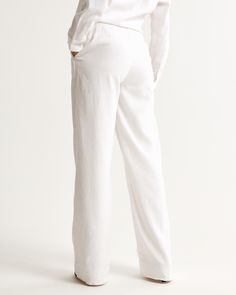 Elevate your wardrobe with the A&F Sloane Tailored Linen-Blend Pant, a perfect blend of sophistication and comfort. Crafted for the modern woman, these pants feature:

- Size: 34 SHORT
- Color: White
- Material: Body - Linen blend, Lining - Viscose
- Gender: Female

Designed with an ultra-high rise and a wide leg cut, these pants offer a tailored fit that flatters your figure. The pleating details add a touch of elegance, while the functional fly and pockets combine practicality with style. The Sloane Tailored Pant, Flat Shoe, Linen Blend Pants, Female Style, American Clothing, Wide Leg Pant, Tailored Pants, White Material, American Apparel