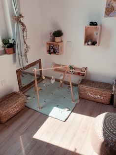 a living room filled with furniture next to a window