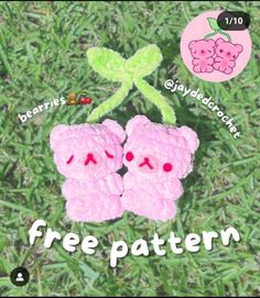 two crocheted pink teddy bears sitting next to each other on grass with the words free pattern below