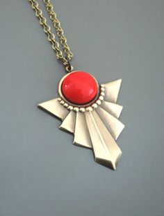 "Vintage Jewelry - Art Deco Necklace - Red Necklace - Vintage Necklace - Pendant Necklace - handmade jewelry This is such a cool! vintage necklace! An Art Deco design pendant embellished with a bright red glass cabochon. The pendant hangs from a pretty vintage brass ladder chain. Chloe says, \"Wear it and feel fabulous!\" This pendant is 1 3/4\" long. You can choose the length you would like at checkout. Thanks for visiting Chloe's" Red Bohemian Nickel-free Necklace, Bohemian Red Nickel-free Necklace, Red Large Pendant Jewelry For Gift, Red Metal Necklace With Large Pendant, Vintage Red Jewelry For Gifts, Red Jewelry With Large Pendant For Gift, Red Necklace With Large Round Pendant, Retro Handmade Necklace For Gift, Handmade Retro Necklaces For Gifts