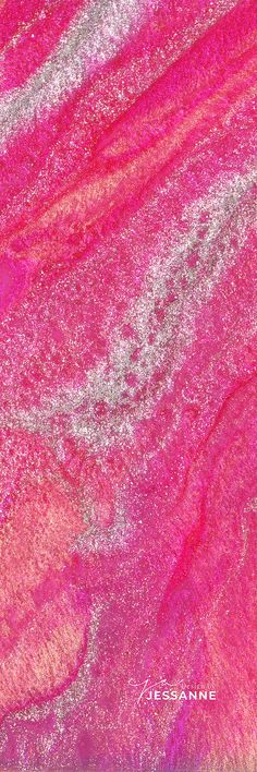 pink and silver paint with white streaks on the surface, as if it were liquid or glitter