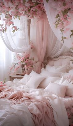 a bed with pink flowers on the headboard and canopy over it, in front of a window