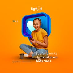 a woman sitting on the ground with a cell phone in her hand and an orange background