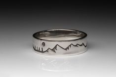 Sterling Silver. 6.5mm width. Mountains, trees and a full moon. What else do you need? *All pieces are made to order* Silver Mountain Ring, Mountain Ring, Mountain Jewelry, Bozeman Mt, Products Photography, Beautiful Lighthouse, Pinterest Ideas, The Wilderness, Silver Band Ring