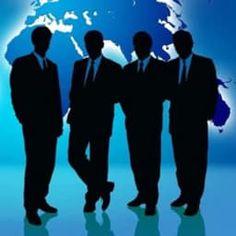 silhouettes of three men in business suits standing next to a map of the world