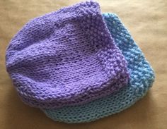 two knitted hats sitting on top of each other with the words pattern only written below them