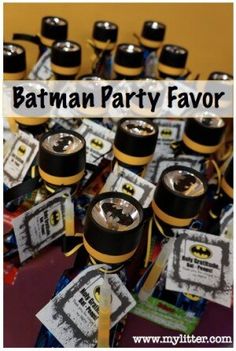 batman party favors are arranged on top of each other with the words, batman party favors