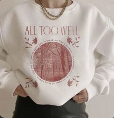 a woman wearing a sweatshirt that says, all too well