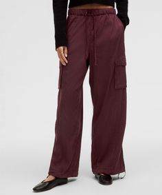 One Pant, Two Looks. These Lightweight, Baggy Cargo Pants Can Be Worn Straight Or Cinched At The Bottom For A Tapered, Jogger-Like Fit. Designed For Casual. Full Length Intended To Sit At Ankle:oversized Fit. Hand Pockets With Hidden Card Sleeve. Cargo Pockets. Pull And Tie The Drawcords At The Hems To Change The Shape. Elasticated Waistband With Adjustable Drawcord. | Lightweight Adjustable Mid-Rise Cargo Pant Cargo Baggy Pants, Baggy Cargo Pants, Tank Top Dress, Cargo Pants Women, Cargo Pant, Pants Design, Leggings Shop, Bottom Clothes, Cargo Pants