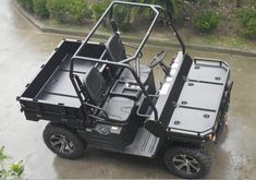 a black utility vehicle parked in a parking lot