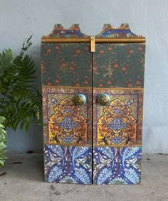 My Moroccan inspired rustic cabinets are made in the decoupage technique, with  many  layers of varnish, distressed with acrylic paint. This cabinet has one shelf. My Cabinets are made to be hung on the wall. Therefore they have two small holes in the backing for the screws.I use them in my kitchen, bathroom, working room for my art supplies etc. They are very charming and look like they just came from Morocco. The size is: 22" high, 13" at the widest point and 7.5"deep. In the bathroom I use them for my make up and medication. Cleaning is easy , just dust them a bit with a cloth. For international shipping Buyers are responsible for any customs and import taxes that may apply Morrocan Cabinet, Working Room, Rustic Cabinets, Work Room, Cabinets Organization, Keepsake Box, Inspired Jewelry, Storage Items, Keepsake Boxes