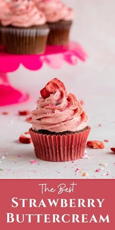 the best strawberry buttercream cupcakes with pink frosting and sprinkles