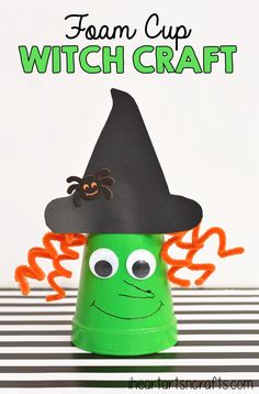 a green cup with a witches hat on top and the words foam cup witch craft above it