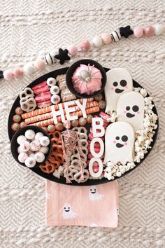 a tray filled with halloween treats on top of a table