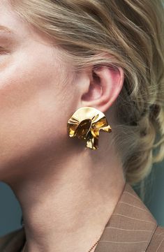 These handcrafted earrings featuring an artfully folded design are the perfect way to elevate your look. 1" drop; 1 1/2" width 14k-gold plate Made in the USA Suede Jewelry, Chunky Sweaters, Gold Vermeil Jewelry, Mini Studs, Oil Slick, Gold Pearl Earrings, Vermeil Jewelry, Solid Gold Jewelry, Enamel Earrings