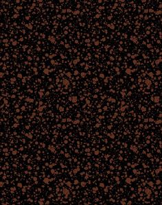 an abstract black and brown background with small dots