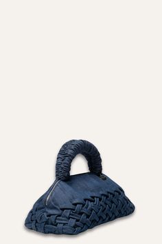 Our bestselling LUNE Mini Bag is an elegant, versatile, and finely-crafted offering. Featuring handwoven basketweave smocking, this new version for Collection 17 is crafted in Dark Blue 100% cotton denim. It has a compact design with a removable cross-body strap, lined interior and interior pocket. Measurements: 4.5" W x 7.5" H. Crochet Elegant Bag, Denim Handbag, Blue Handbag, Denim Handbags, Denim Purse, Hand Smock, Blue Handbags, Cross Body Bags, Elegant Bags