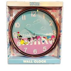 a wall clock with cartoon characters on it's face in a pink and blue box