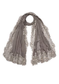 Handcrafted to perfection, this mousse scarf harmoniously blends the softness of wool and smoothness of silk for that luxurious feel against your skin. However, the true allure of this scarf lies in its exquisite tonal mousse corded lace border, which brings out the vintage charm and timeless elegance of this signature creation. Wrap yourself in warmth and style, as this scarf becomes the centerpiece of your ensemble. Elegant Pashmina Shawl For Evening, Luxury Beige Scarf For Formal Occasions, Luxury Beige Formal Scarf, Elegant Beige Formal Shawl, Elegant Silk Shawl For Winter, Elegant Winter Pashmina Shawl, Elegant Winter Silk Scarf, Elegant Beige Silk Scarf, Elegant Silk Scarf For Winter