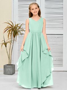 This Fantastic Chiffon Junior Bridesmaid Dress is designed with elegant chiffon fabric, which ensures it is lightweight and comfortable for young wearers. It is also made to be wrinkle-resistant, making it a great option for extended wear occasions like weddings or formal events. Champagne Chocolate, Orange Orchid, White Wisteria, Junior Bridesmaid Dress, Junior Bridesmaid Dresses, Junior Bridesmaid, Dress Purchase, Pink Candy, Chiffon Fabric