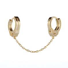 Embrace your individuality and express your inner confidence with Gold & Diamond Handcuff Design Earring, a symbol of strength, independence, and unapologetic style. Designed specifically for double pierced ears, this earring offers a bold and contemporary look that is sure to turn heads. Each earring features a unique handcuff motif adorned with pave Cz diamonds, adding a touch of glamour and sophistication. Between the cuffs, a delicate chain gracefully connects them, creating an alluring and Double Pierced Ears, Inner Confidence, Wrap Earrings, Delicate Chain, Design Earrings, Cz Diamond, Single Earring, Cuff Earrings, Polish Jewelry