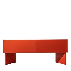 an orange shelf with two doors on it