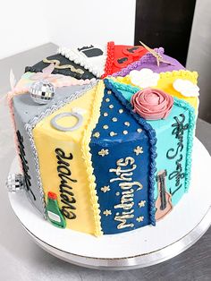 a cake decorated with different colors and designs