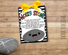 a card with an image of a rock and the words worry stone on it