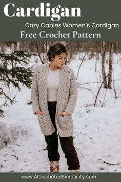 a woman standing in the snow wearing a cardigan