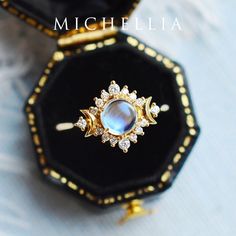 "Our current turnaround time for regular orders is 6-8 weeks.  For urgent orders, please shop our Ready-to-Ship collection below (7-10 business days): https://michellia.com/collections/ready-to-ship (please copy and paste into browser) -------- 「Selene」-  Moon Goddess Ring, in Rainbow Moonstone | R3010  ♥ Product Summary ♥ Main Stone: Natural Moonstone, Round Cabochon Cut, 6mm*6mm Accent Stone: Genuine Diamonds, G color, VS clarity Ring Band: 1.5mm - 2mm Metal Choice: 14K or 18K Solid Gold (Rose, White, or Yellow) and Platinum ♥ Style Guide ♥ - This listing sells the main ring only - other jewelry pieces shown in the pictures are for reference only. - Other center stone options: https://michellia.com/search?type=product&q=selene - Whenever possible, we recommend purchasing the main ring an Selene Moon Goddess, Goddess Ring, Celestial Wedding, Moon And Star Earrings, Moonstone Engagement, Moonstone Engagement Ring, Moon Ring, Moon Goddess, Eternity Band Diamond