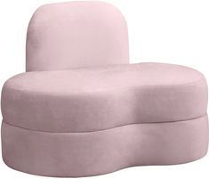 a pink couch sitting on top of a white floor