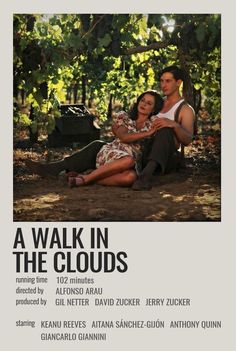 a walk in the clouds poster with a man and woman sitting under a tree together