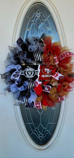 a soccer wreath is hanging on the front door