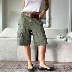 Vintage y2k khaki green cargo shorts low rise short cargo pocket shorts. Model is 32D/26 waist/5ft. Measures 34 inches waist by 11 inches inseam. Tagged size 32W. Green Cargo Shorts, Shorts Low Rise, Khaki Cargo Shorts, Short Cargo, Low Rise Shorts, Pocket Shorts, Green Cargo, Shorts Cargo, Cargo Pocket