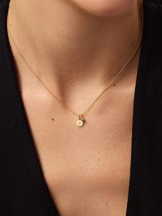 The stars have aligned in this celestial-inspired gold pendant necklace. Crafted in solid gold, this waterproof and tarnish-free set features a dainty gold ball chain with two charms--one gold star charm with a lab-grown diamond and one mini birthstone charm with a sapphire gemstone. Tie your look together with the perfect pop of color and pair this set with our Gold Huggie Hoops for a timeless finishing touch. The Gold Midnight Star Necklace includes three pieces: Dainty Gold Necklace - Gold Ball Chain Necklace, Gold Pendant - Gold Star Charm, & Birthstone - Gold Mini Birthstone Charm. • Crafted in recycled solid gold • Set of one necklace & two charms • Lab-grown diamond & sapphire gemstone Ball Chain Necklace Gold, Gold Ball Chain, Mini Necklace, Solid Gold Necklace, Ball Chain Necklace, Dainty Gold Necklace, Necklace Craft, Pendant Gold, Birthstone Charms