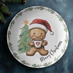 a christmas plate with a teddy bear holding a cup