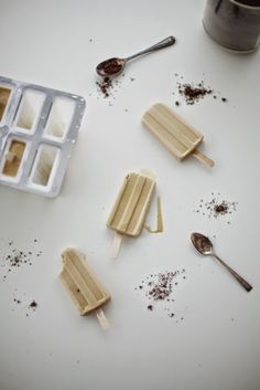 some ice cream and spoons on a table