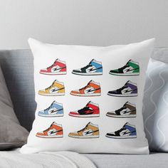 a throw pillow with different colored sneakers on it