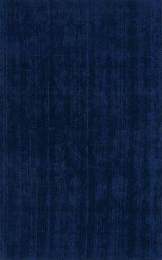 a dark blue rug with vertical stripes on the top and bottom, it is very soft