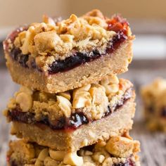 three peanut butter and jelly bars stacked on top of each other with the title above it