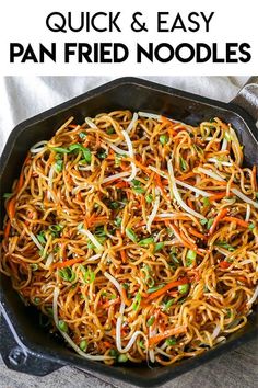 a skillet filled with noodles and vegetables