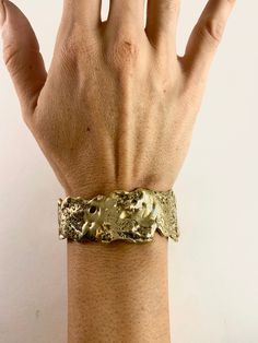 Handmade bronze cuff .75 in. In width. Elegant Antique Gold Brass Cuff Bracelet, Luxury Gold Hammered Cuff Bracelet, Handmade Bronze Cuff Bracelet For Formal Occasions, Unique Bronze Cuff Bracelet For Formal Occasions, Bronze Hand Cast Cuff Bracelet Gift, Hand Cast Bronze Cuff Bracelet Gift, Hand Cast Bronze Cuff Bracelet For Gift, Bronze Brass Bangle Cuff Bracelet, Unique Brass Cuff Bracelet For Formal Occasions