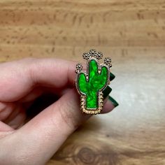 Fun Cactus Ring With Vibrant Green Enamel. Only One Size, Size 6 New/ Unused Metal: Zinc Alloy - Tag: Plant, Cacti, Cactus, Desert, Sun, Leaf, Leaves, Spring, Summer, Fall, Floral, Statement, Boho, Tribal, Unique, Huge, Cocktail, Solitaire, Flower, Women, Diamond, Luxury, Wedding, Anniversary, Engagement, Halloween, Women, Woman, Flower, Floral, Pearl, Faux, Winter, Summer, Spring, Fall, Xmas, Nye, Rose Gold, Designer, Star, Engagement , Anniversary, Birthday, Wedding, Diamond,White Gold, Statem Cactus Ring, Woman Flower, Flower Women, Cactus Desert, Wedding Diamond, Desert Sun, Women Diamond, Green Enamel, Vibrant Green