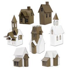 paper houses are arranged in the shape of small buildings