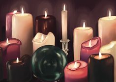 many different colored candles with one candle lit