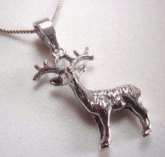 Deer Buck 925 Sterling Silver Pendant Reindeer     Metal: .925 Sterling Silver Pendant measures: Just over 1 by 7/16 inches including the bail (27 by 11.5 mm)        Item does not come with chain pictured.      Be sure to add me to your favorites list!     comes with a free gift box* *Combined items will be shipped with one gift box.        item: a199 Deer Jewelry, Deer Necklace, Deer Buck, Favorites List, Fine Jewellery Necklace, Necklace Silver, Sterling Silver Pendant, Sterling Silver Chains, Free Gift