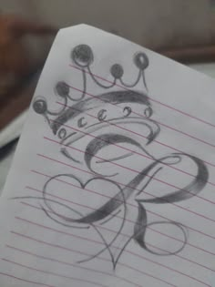 a piece of paper with a drawing of a crown on it