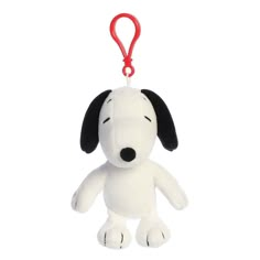 Carry the spirit of Peanuts wherever you go with the Snoopy Plush Keychain by Aurora. A mini version of the iconic Snoopy, complete with a red collar and a smile that warms hearts. This plush keychain is the perfect accessory for fans wanting to keep their favorite character close at hand. Durable, soft, and utterly charming, it's not just a keychain, but a small token of the joy that Peanuts brings. Established in 1981, Aurora World is a renowned global leader in plush toys and high-quality gif Snoopy Keychain, Snoopy Plush, Classic Characters, Plush Collection, Peanuts Cartoon, Peanuts Characters, Plush Keychain, The Peanuts, Character Collection